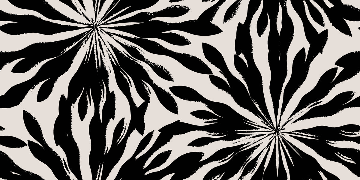 Cream and black shibori sunburst pattern on self-adhesive wallpaper