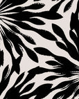 Cream and black shibori sunburst pattern on self-adhesive wallpaper