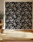 Shibori sunburst wallpaper featuring an abstract black and cream design for easy peel and stick application