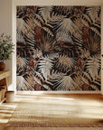 Peel and stick wallpaper featuring a dark botanical pattern with rust and grey fern leaves.