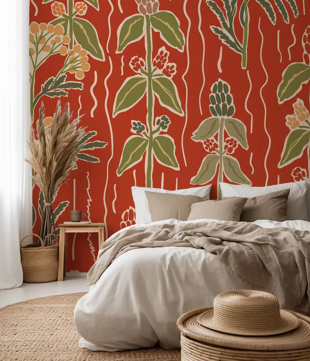 Ember Meadow self-adhesive wall covering featuring a botanical herb pattern in earthy red and verdant green
