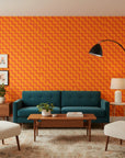Ember Mosaic bold orange geometric wallpaper in a warm and inviting living room