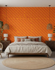 Ember Mosaic bold orange geometric wallpaper adding character to a cozy bedroom