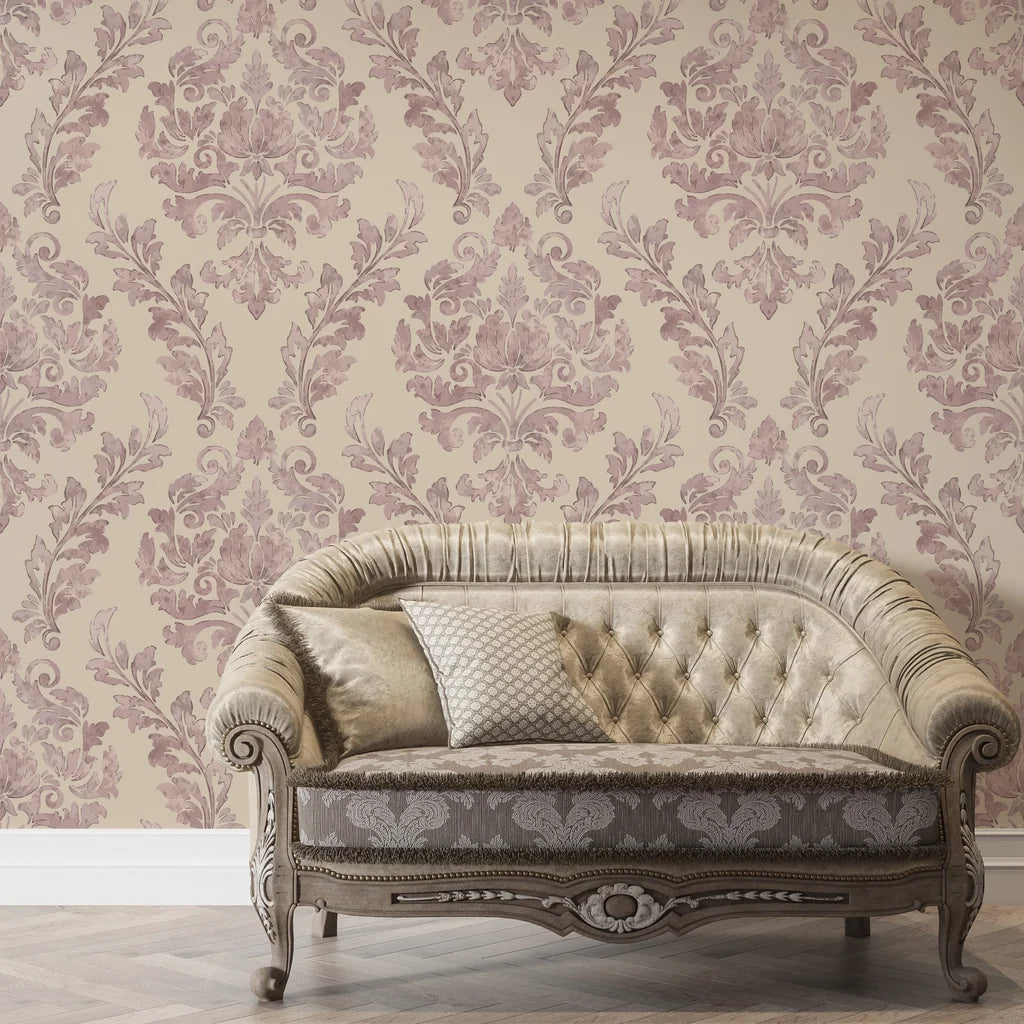 Mauve and cream Embroidered Floral Dream damask wallpaper behind tufted vintage sofa in elegant living room