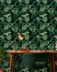 Emerald Jungle deep green tropical botanical wallpaper as a feature wall in a bright home office