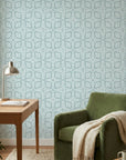 Emerald Lozenge cool geometric peel and stick wallpaper as a feature wall in a bright home office