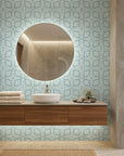 Emerald Lozenge cool geometric peel and stick wallpaper creating ambiance in a serene bathroom