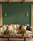 Emerald Slant forest green abstract wallpaper in a warm and inviting living room