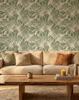 Emerald Whispers delicate leaf wallpaper in a warm and inviting living room