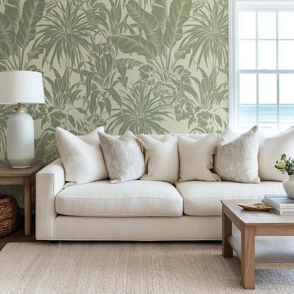 Retro-style tropical leaf wallpaper in a monochromatic sage green hue with self-adhesive backing