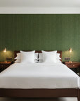Emerald Deco emerald green art deco wallpaper adding character to a cozy bedroom
