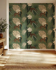 Peel and stick wall covering featuring leopards and white orchids on a dark green jungle backdrop