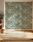 Sage green and cream abstract palm leaf pattern on self-adhesive wallpaper