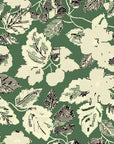 Self-adhesive wallpaper featuring a distressed green and cream botanical flower print