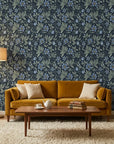 Evening Whisper navy blue vintage floral vine wallpaper in a warm and inviting living room