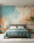 Faded Fresco teal and coral abstract wallpaper in a warm and inviting living room