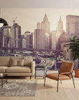 Faded Glory New York skyline mural wallpaper featuring Brooklyn Bridge and sepia-toned skyscrapers in modern living room