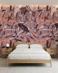 Faded Lattice dusty pink and purple abstract camouflage wallpaper adding character to a cozy bedroom