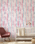 Faded Orchard Drift pink and blue floral wallpaper adding character to a cozy bedroom