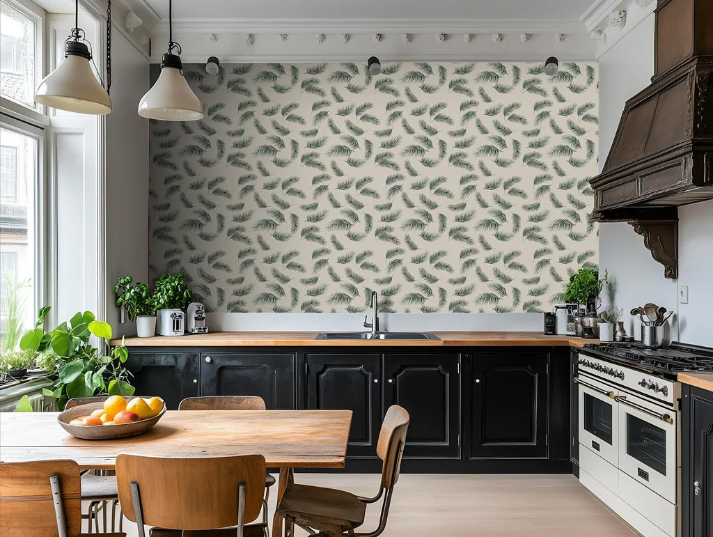 Palm leaves strewn across a botanical print wallpaper
