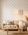 Falling Grace soft pink chevron arrow wallpaper in a warm and inviting living room