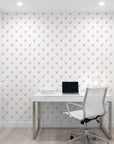 Falling Grace soft pink chevron arrow wallpaper as a feature wall in a bright home office