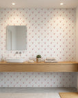 Falling Grace soft pink chevron arrow wallpaper creating ambiance in a serene bathroom