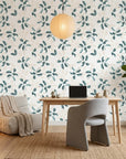 Falling Softly blue botanical peel and stick wallpaper as a feature wall in a bright home office