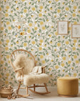 Field Gold yellow botanical peel and stick wallpaper as a feature wall in a bright home office