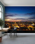 Jerusalem skyline at dusk First Light mural wallpaper with golden city lights and dramatic blue sunset clouds