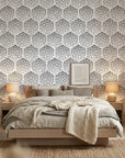 First Snow grey polka dot peel and stick wallpaper adding character to a cozy bedroom