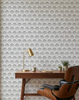 First Snow grey polka dot peel and stick wallpaper as a feature wall in a bright home office