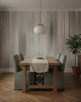 Flowing Silk silver champagne draped creating ambiance in a serene bathroom
