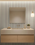 Fog & Stone neutral striped peel and stick wallpaper creating ambiance in a serene bathroom