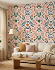 Folk Bloom cheerful floral wallpaper in a warm and inviting living room