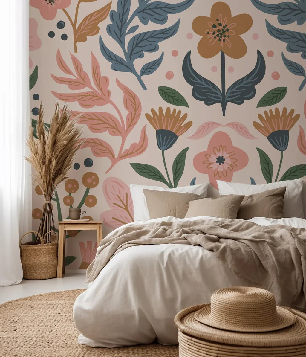 A gentle folk-art style wall covering depicting stylized berries, leaves, and blooms, rendered in warm ochre, dusty blue, muted pink, and sage green tones, set against a faint blush backdrop