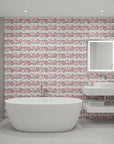 Folk Rose Stitch red and black folk rose wallpaper creating ambiance in a serene bathroom