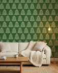 Forest green botanical wallpaper with cream fern pattern in modern living room setting