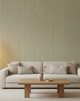 Forest Ledger sage green stripe wallpaper in a warm and inviting living room