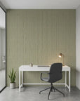 Forest Ledger sage green stripe wallpaper as a feature wall in a bright home office