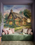 Whimsical Foxglove Cottage mural wallpaper featuring thatched-roof cottage with gardens at twilight in reading nook