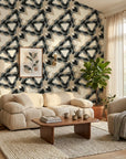 Fractured Light black and grey geometric shard wallpaper in a warm and inviting living room