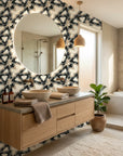 Fractured Light black and grey geometric shard wallpaper creating ambiance in a serene bathroom