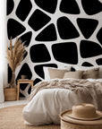 Monochrome self-adhesive wallpaper featuring an abstract design of irregular spots, titled Fractured Night