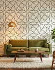 Fragmented Orbit black and cream abstract dashed line wallpaper in a warm and inviting living room