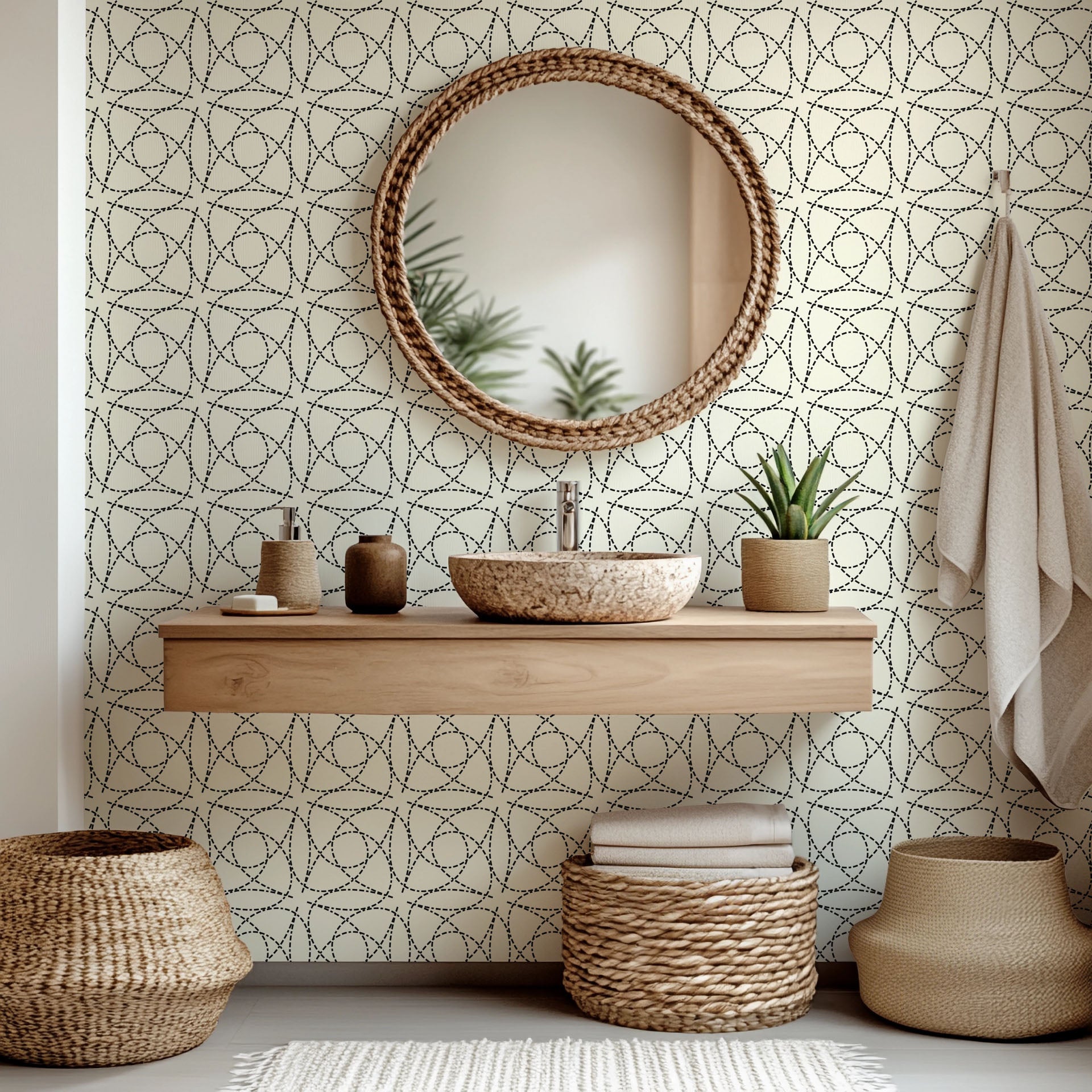 Removable wallpaper featuring a black and cream geometric abstract design of segmented, curved lines (Fragmented Orbit)