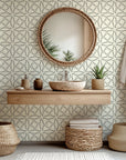 Removable wallpaper featuring a black and cream geometric abstract design of segmented, curved lines (Fragmented Orbit)