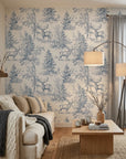 Frost & Fable serene blue woodland toile wallpaper in a warm and inviting living room