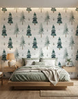 Frosted Woods sage green watercolor pine tree wallpaper adding character to a cozy bedroom