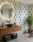 Frosted Woods sage green watercolor pine tree wallpaper creating ambiance in a serene bathroom